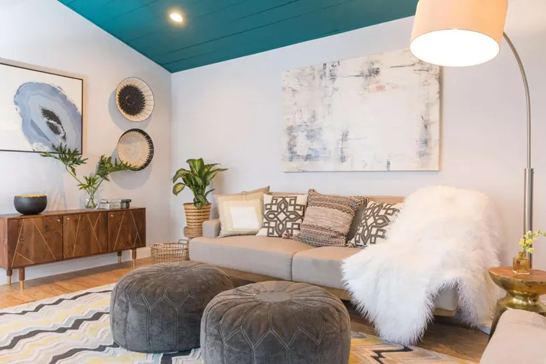 Painted ceiling against white walls for contrast and illusion of increased height
Painted ceiling against white walls for contrast and illusion of increased height