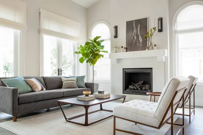 Minimalist living room with low-slung armchairs
Minimalist living room with low-slung armchairs