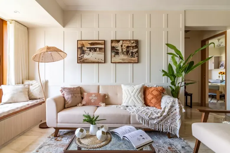 Bohemian-styled living room with throw blanket and low height furniture Bohemian-styled living room with throw blanket and low height furniture