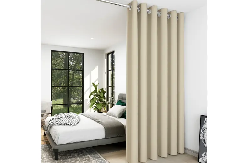 Small bedroom with curtains separating different areas for privacy.
Small bedroom with curtains separating different areas for privacy.