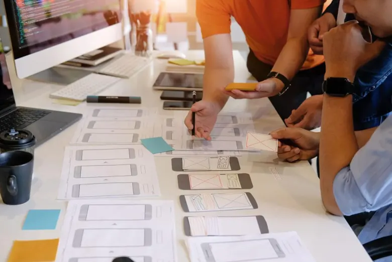 UX designers creating wireframes to reduce cognitive load UX designers creating wireframes to reduce cognitive load