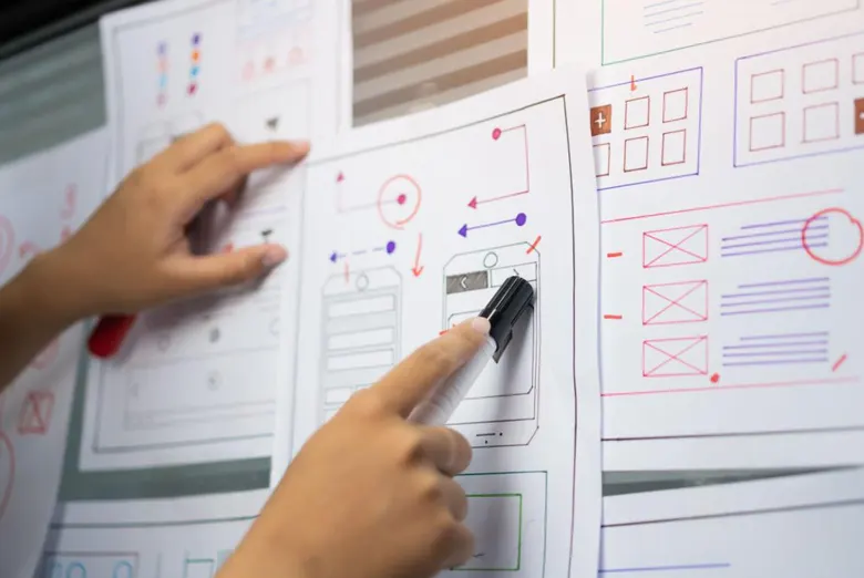 Designer creating app information architecture.
