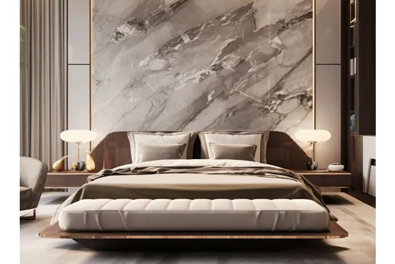 A bed with a bookmarked marble headboard.A bed with a bookmarked marble headboard.