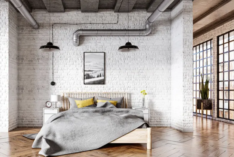 A master bedroom with industrial features.
