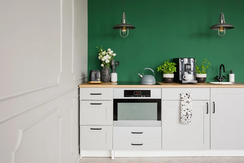 Incorporation of an accent wall in kitchen design to create a contrast
