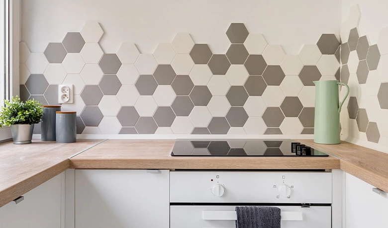 Patterns and textures used against solid colours in a modern kitchen
