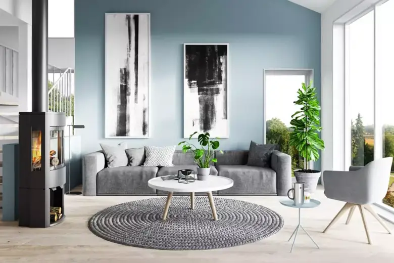 A living room with floor-to-ceiling windows, a centre table on a round carpet and a comfortable seating arrangement A living room with floor-to-ceiling windows, a centre table on a round carpet and a comfortable seating arrangement