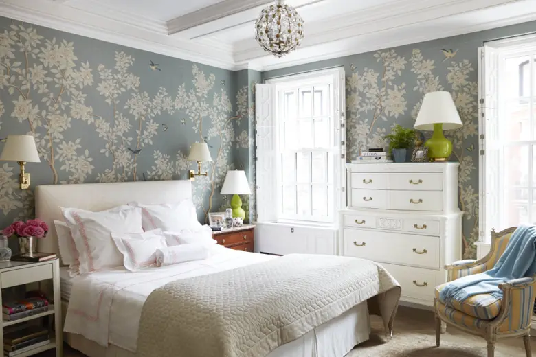 A bedroom with floral wallpapers A bedroom with floral wallpapers