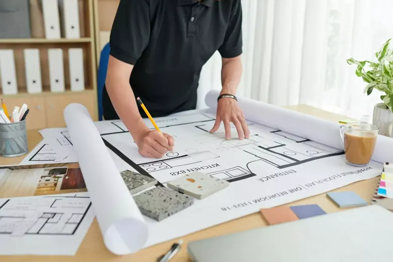 Residential Interior Designer working on the floorplan for a project