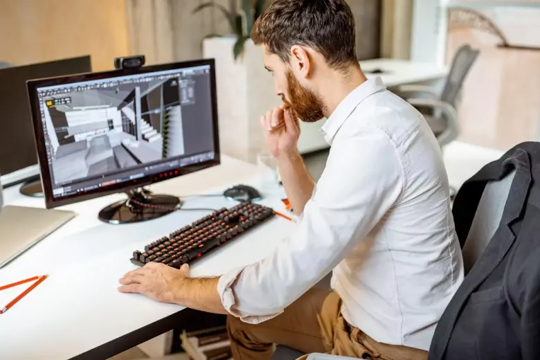 Residential interior designer using 3D software to visualise the final output Residential interior designer using 3D software to visualise the final output