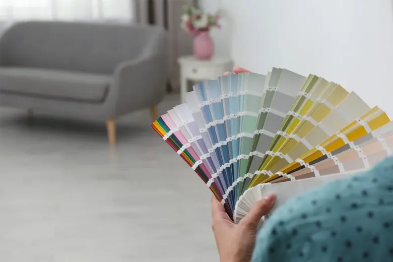 Interior designer assessing which colours will best suit the space
Interior designer assessing which colours will best suit the space