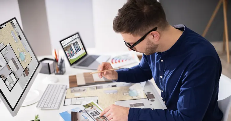 An interior designer in training working on a commercial design project