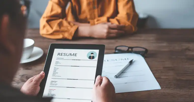 Graphic designer resume assessment during an interview.