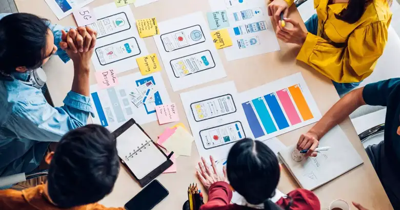 UI UX designers reviewing different prototypes