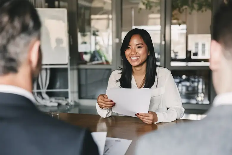 Young candidate explaining a UX design project during the interview for a UX designer position.
Young candidate explaining a UX design project during the interview for a UX designer position.