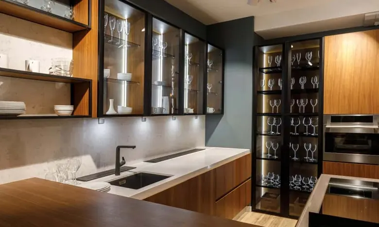 Indian parallel kitchen interior design idea with glass shutters.
Indian parallel kitchen interior design idea with glass shutters.