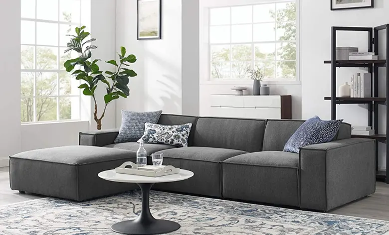Sectional sofas situated in the middle of a luxury living room. Sectional sofas situated in the middle of a luxury living room.
