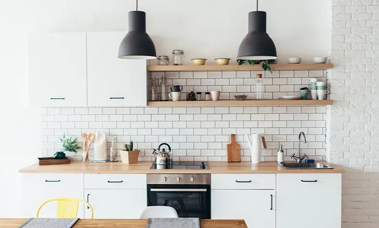 Indian parallel kitchen interior design idea with wall-mounted lights. Indian parallel kitchen interior design idea with wall-mounted lights.