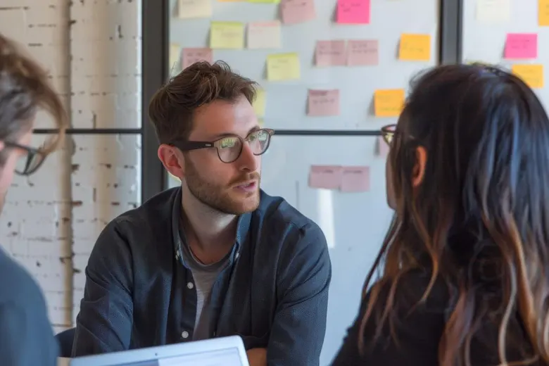 A team of UX designers brainstorming ideas.
A team of UX designers brainstorming ideas.