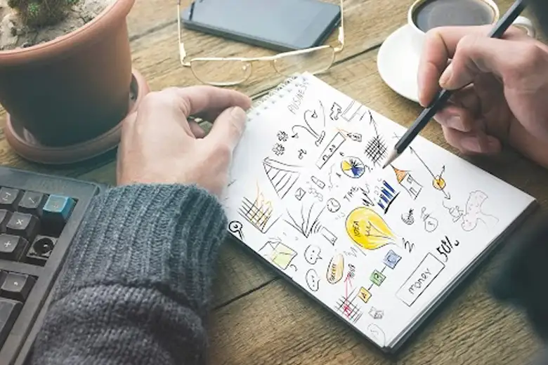 UI designer sketching interface functionalities and checking color themes using design tools and ideas.