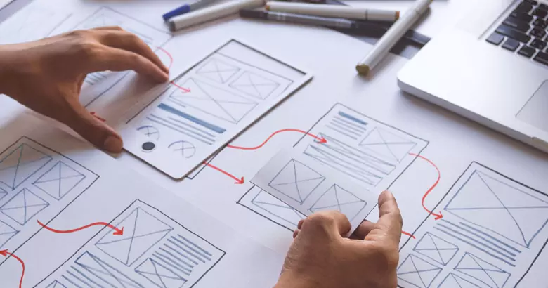 A UI game designer creating prototype for a game.