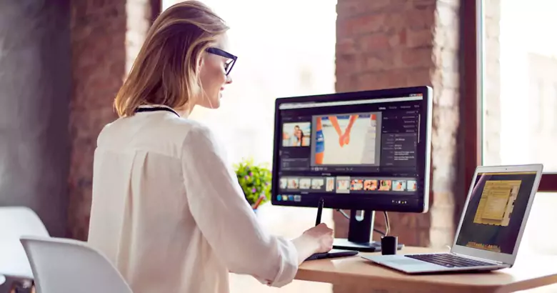 Graphic designer creating Illustration via software
