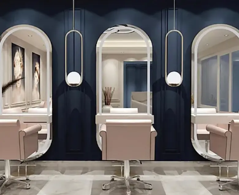 Small salon interior design idea with a statement mirror.
