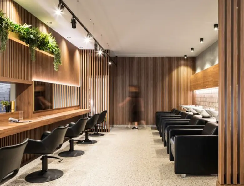 Textured walls and cozy lighting create a warm ambiance.
