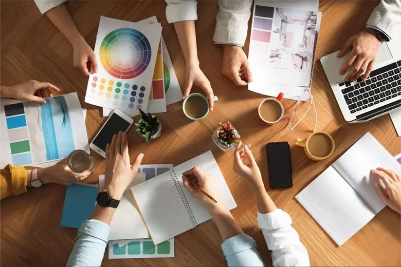 A group of graphic designers working on a project.
A group of graphic designers working on a project.