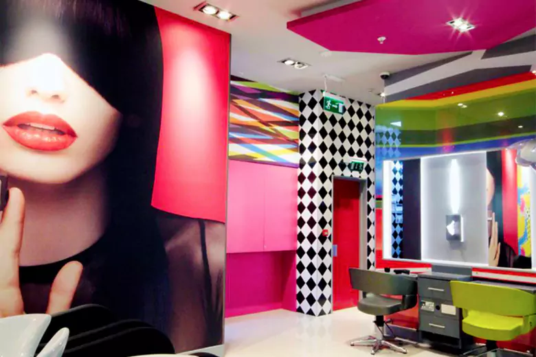 Maximalist salon design featuring bold colors and patterns, creating a vibrant and lively atmosphere. Maximalist salon design featuring bold colors and patterns, creating a vibrant and lively atmosphere.