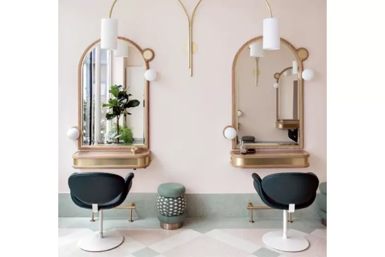 Salon interior featuring art deco touches with metallic finishes and rich materials for elegance.
Salon interior featuring art deco touches with metallic finishes and rich materials for elegance.