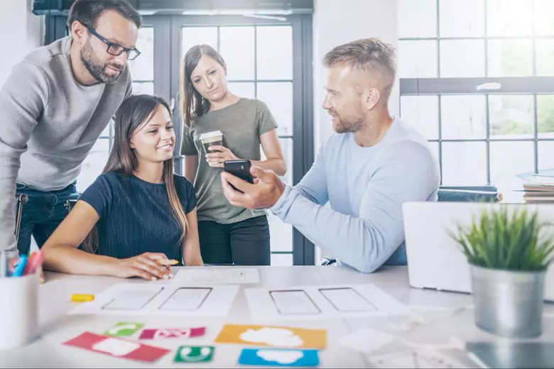 A team of UI UX designers working on creating wireframes for a website
A team of UI UX designers working on creating wireframes for a website