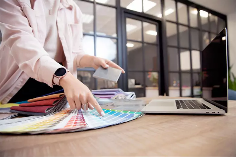 Student learning about color theory in a graphic design school.
Student learning about color theory in a graphic design school.