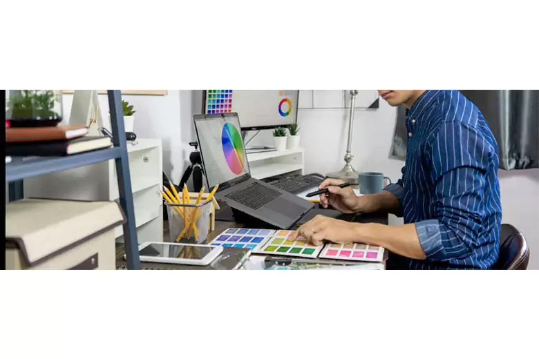 A designer choosing the color palette for their packaging design.