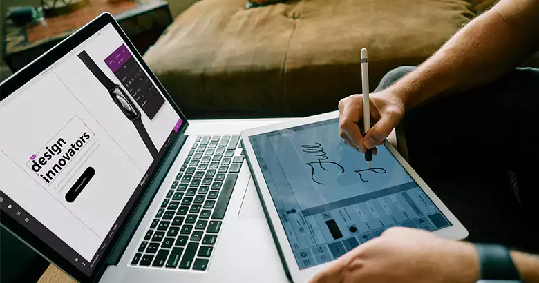 A graphic designer using vintage fonts in their design.