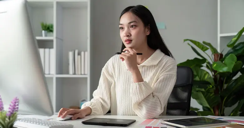 A well-known graphic designer working on her latest design.