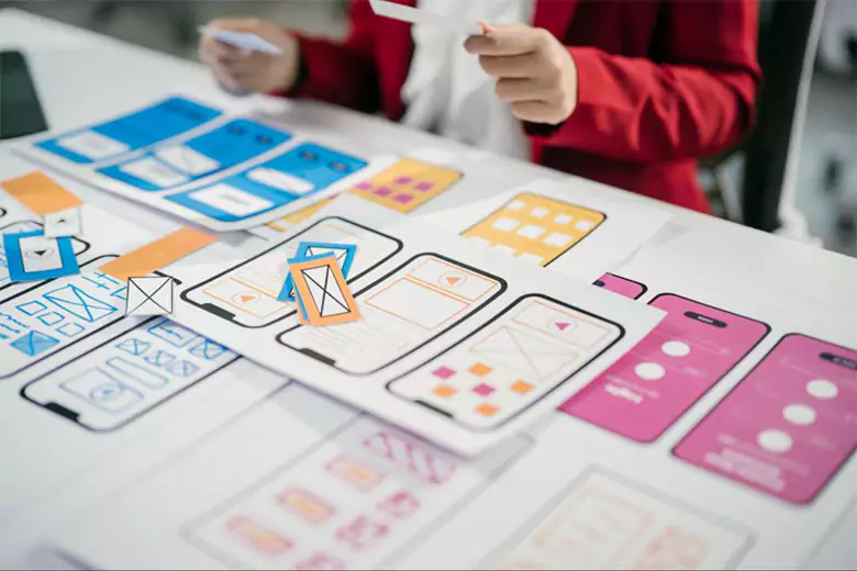 A designer planning to create an app wireframe. A designer planning to create an app wireframe.