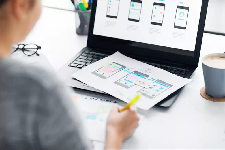 A designer working on creating a Login page.
