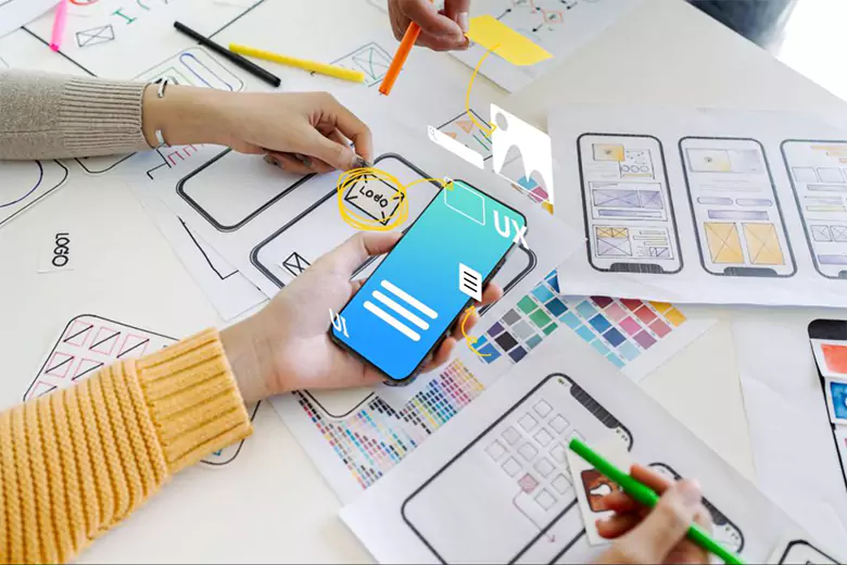 UI UX designers evaluating a Login page UI design.
