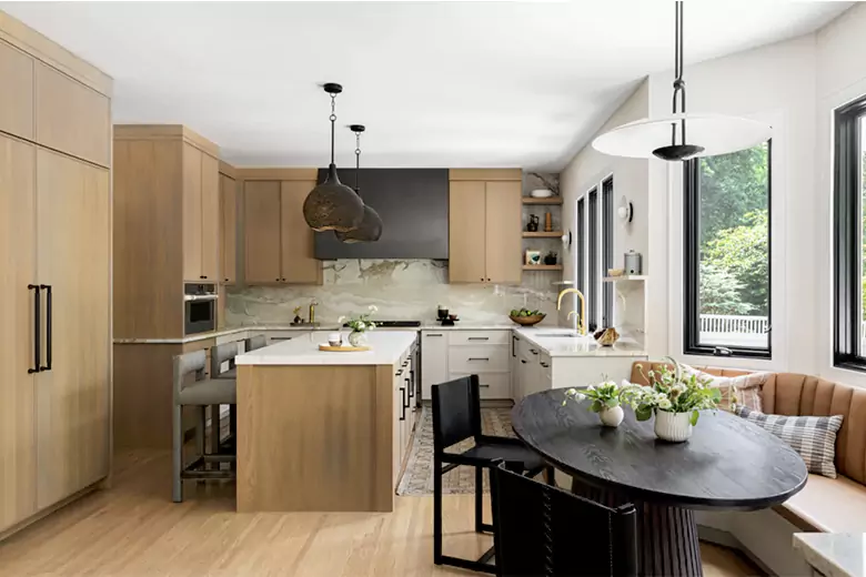 Image showcasing a cozy built-in breakfast nook with comfortable seating arrangement and featuring open windows. Image showcasing a cozy built-in breakfast nook with comfortable seating arrangement and featuring open windows.