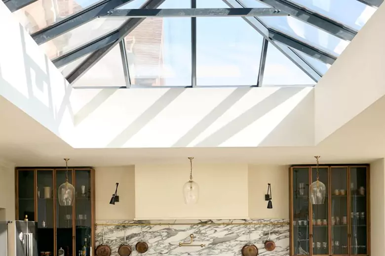 Skylights allow natural light to enter the space, creating a bright, airy atmosphere. Skylights allow natural light to enter the space, creating a bright, airy atmosphere.