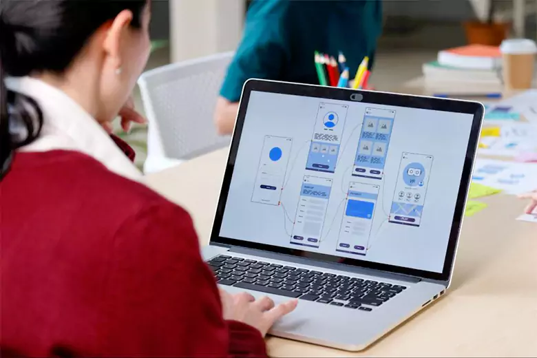 A UX designer conducting user research. A UX designer conducting user research.