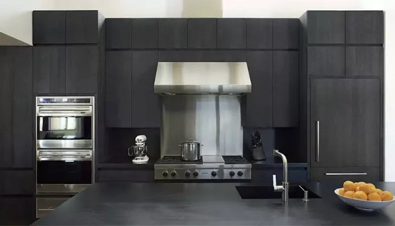 Minimalist cabinetry featuring hidden handles for a sleek, modern look. Minimalist cabinetry featuring hidden handles for a sleek, modern look.