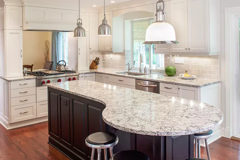 Natural stone countertops in a kitchen, showcasing a beautiful marble durable surface. Natural stone countertops in a kitchen, showcasing a beautiful marble durable surface.