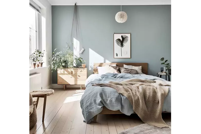 A bedroom with layered textures for a cozy look A bedroom with layered textures for a cozy look