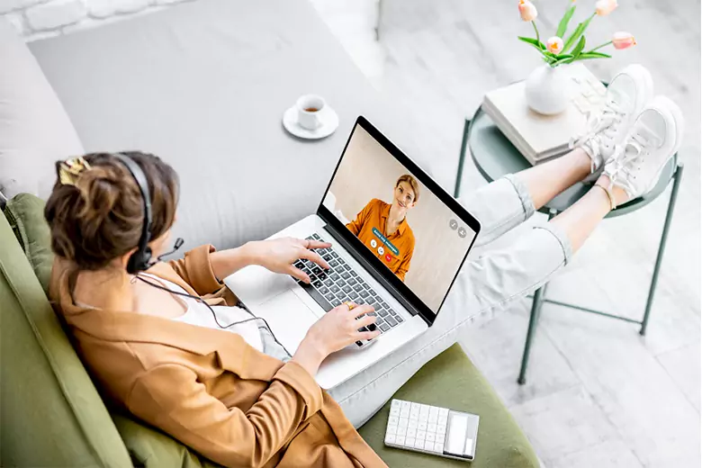 Young woman working remotely, discussing salary details with an HR online. Young woman working remotely, discussing salary details with an HR online.