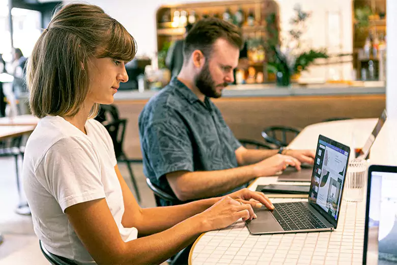 Student comparing the fees, duration, and format of graphic design programs