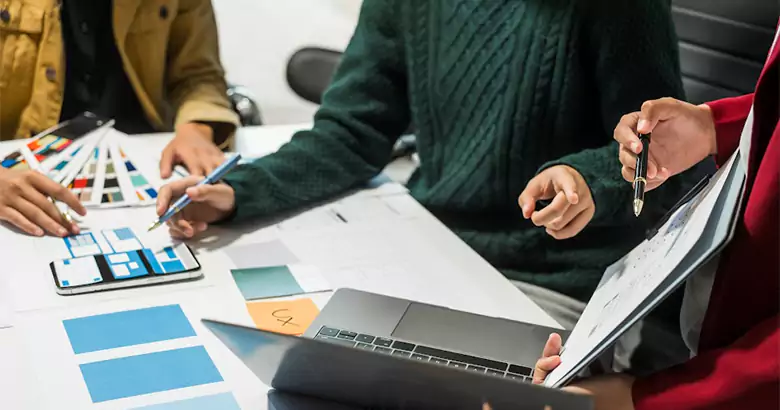 “UX designers creating accessible interfaces”