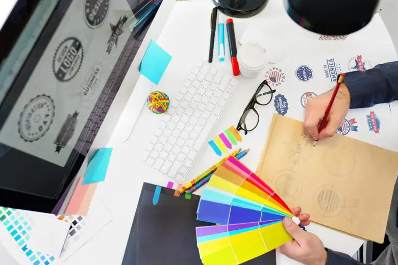 Picture of a designer working with Adobe InDesign software on a logo project.
Picture of a designer working with Adobe InDesign software on a logo project.