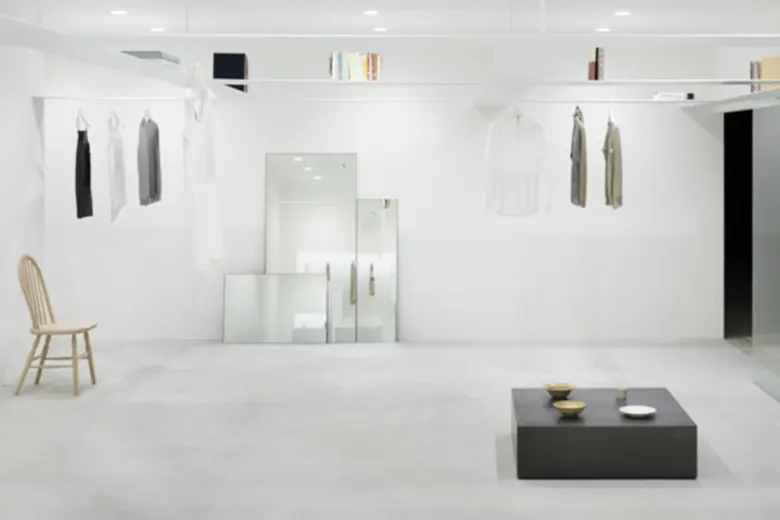 Minimalist showroom design with a focus on open space and natural light.